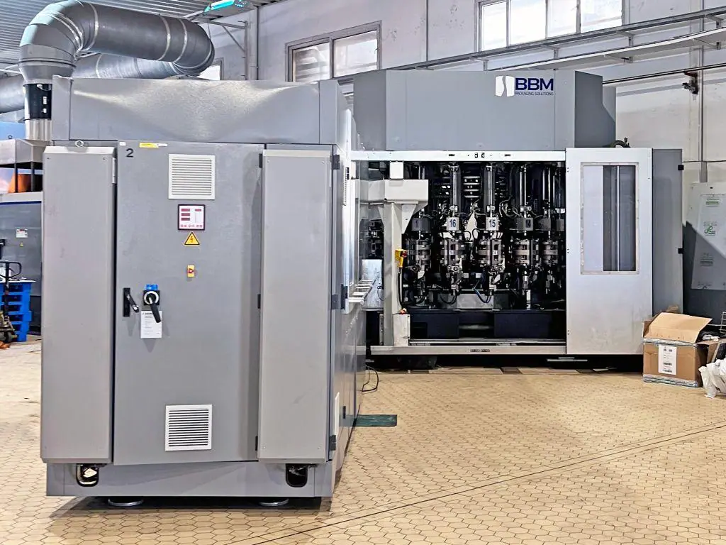 From water to oil: the conversion of a KRONES blow molding machine